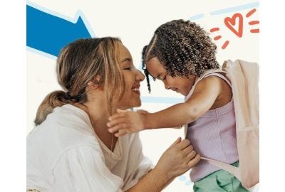 mother putting backpack on child